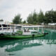 Perahu bersandar di Dermaga Pulau Tidung Kecil, Kepulauan Seribu, Jakarta, Jumat (24/6/2022).